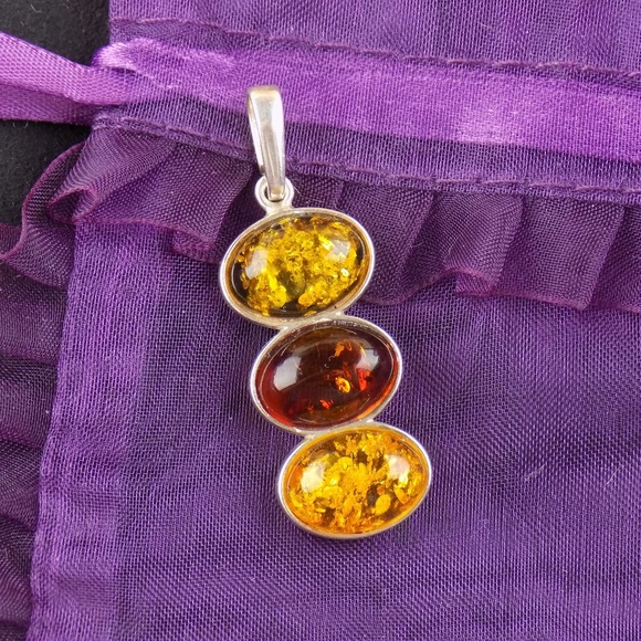 Jewelry - STERLING HONEY GOLDEN GREEN TRIO AMBER pendant